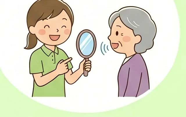 鏡を使って発語・飲み込みの練習をする様子